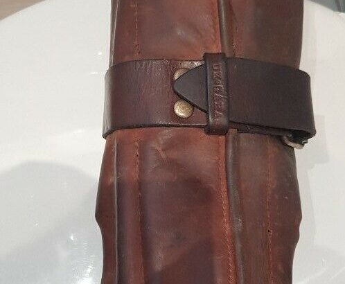 LOST brown leather tool roll containing tools, fastens with single large buckle