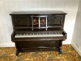 Upright black piano