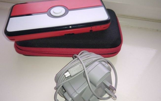 Nintendo 2DS XL Pokémon Collectable Console Plus 6 Games & Carry Case.